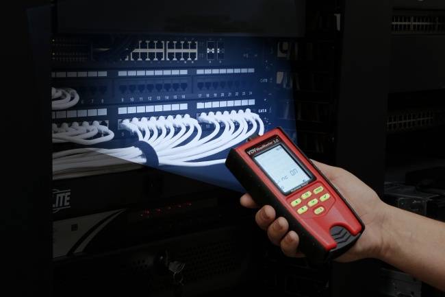 VDV MapMaster cable tester in use at a patch panel